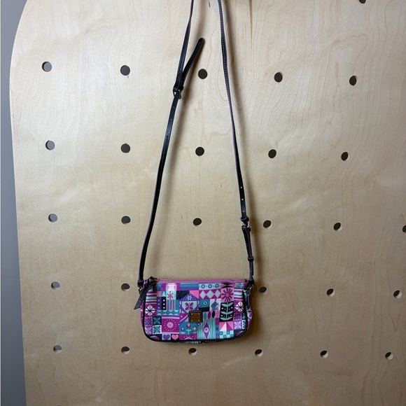 Authentic DisneyParks "It's a Small World" Crossbody; Dooney & Bourke - Picture 2 of 7